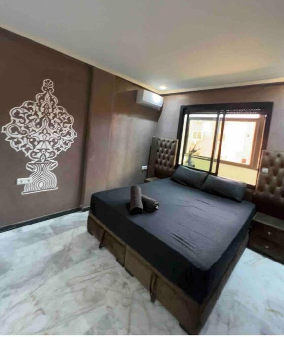 Appartement Bien Situe A Gueliz マラケシュ エクステリア 写真